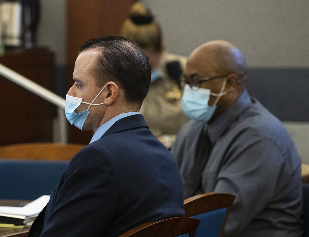 Michael Rusk, left, and Cortrayer Zone, appear in court at the Regional Justice Center, on Thur ...
