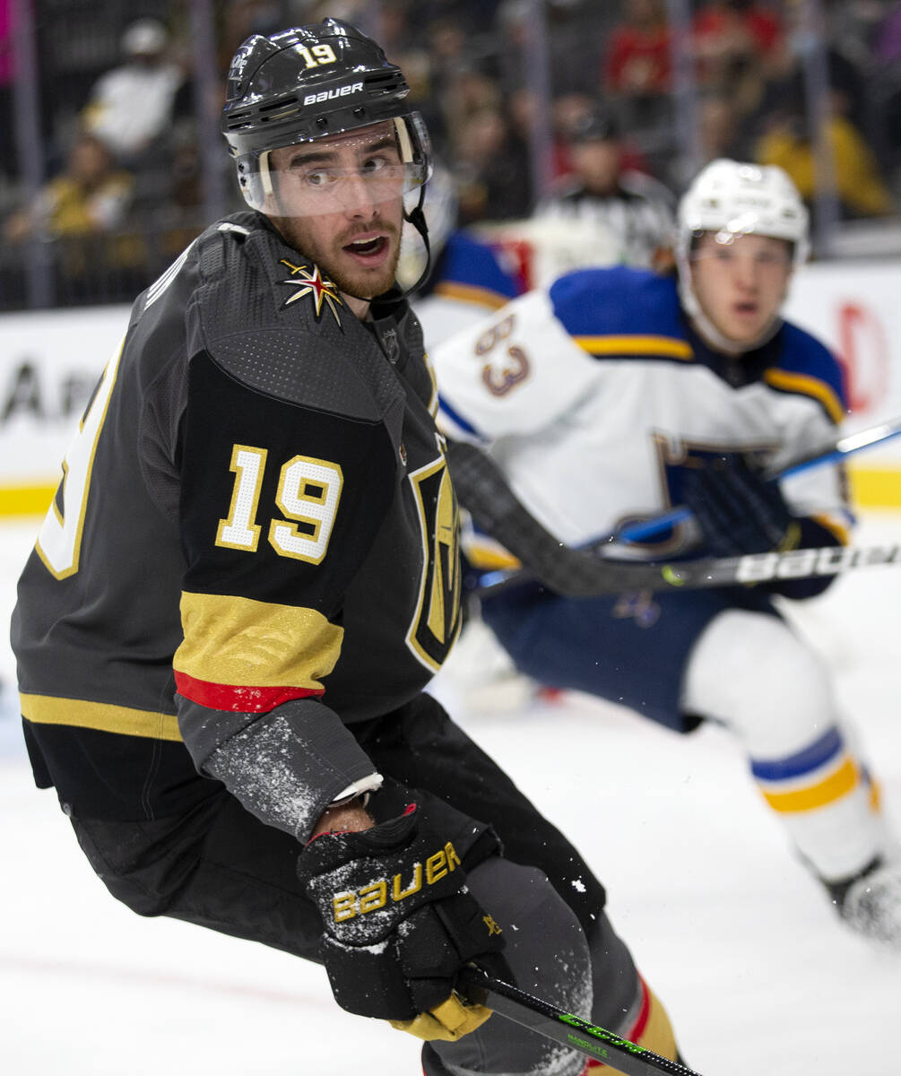 Golden Knights right wing Reilly Smith (19) skates around the net followed by Blues defenseman ...