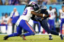 Tennessee Titans running back Derrick Henry (22) carries the ball during a Monday Night NFL foo ...