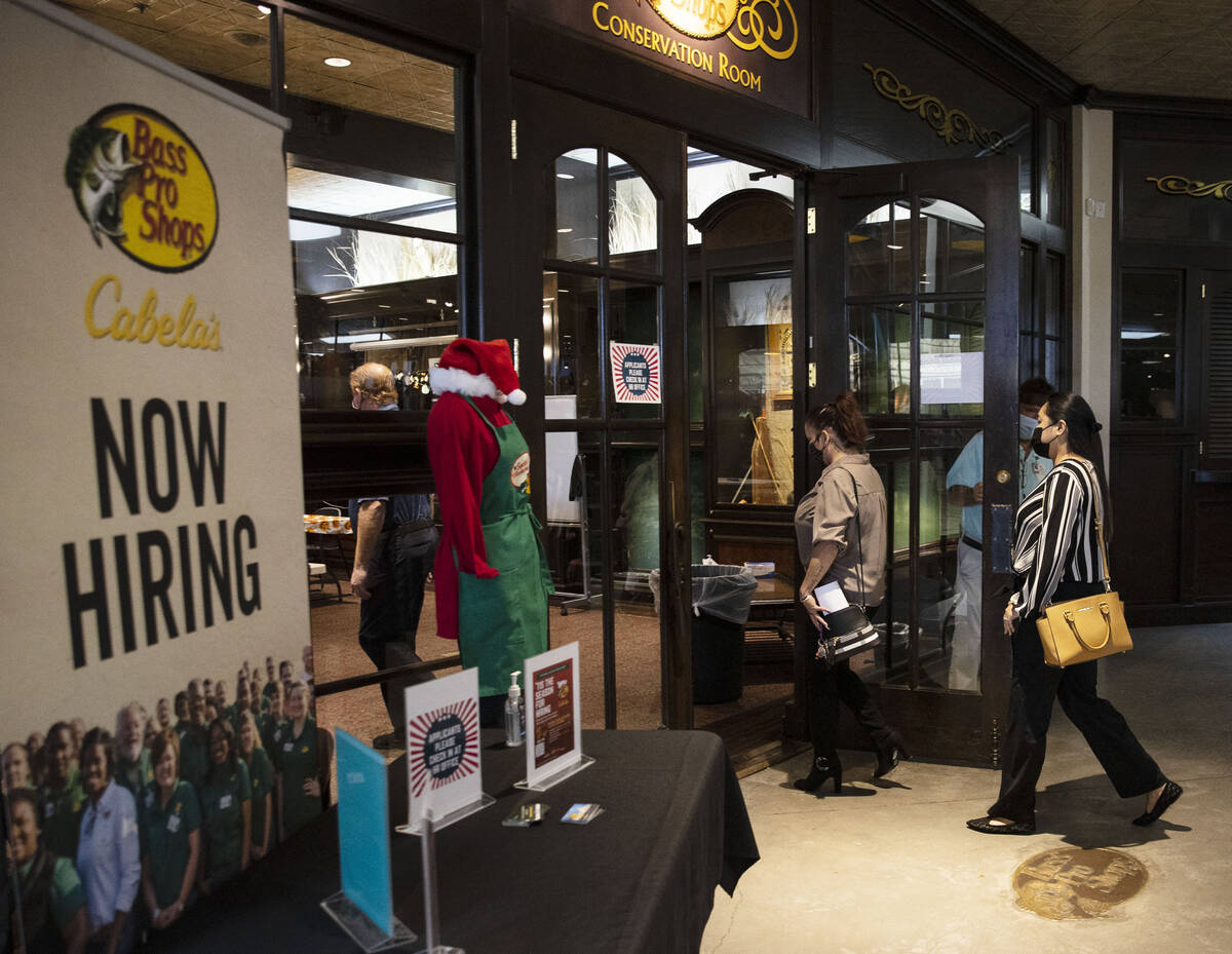 Job seekers arrive at a Bass Pro Shop job fair, on Thursday, Oct. 14, 2021, in Las Vegas. The ...