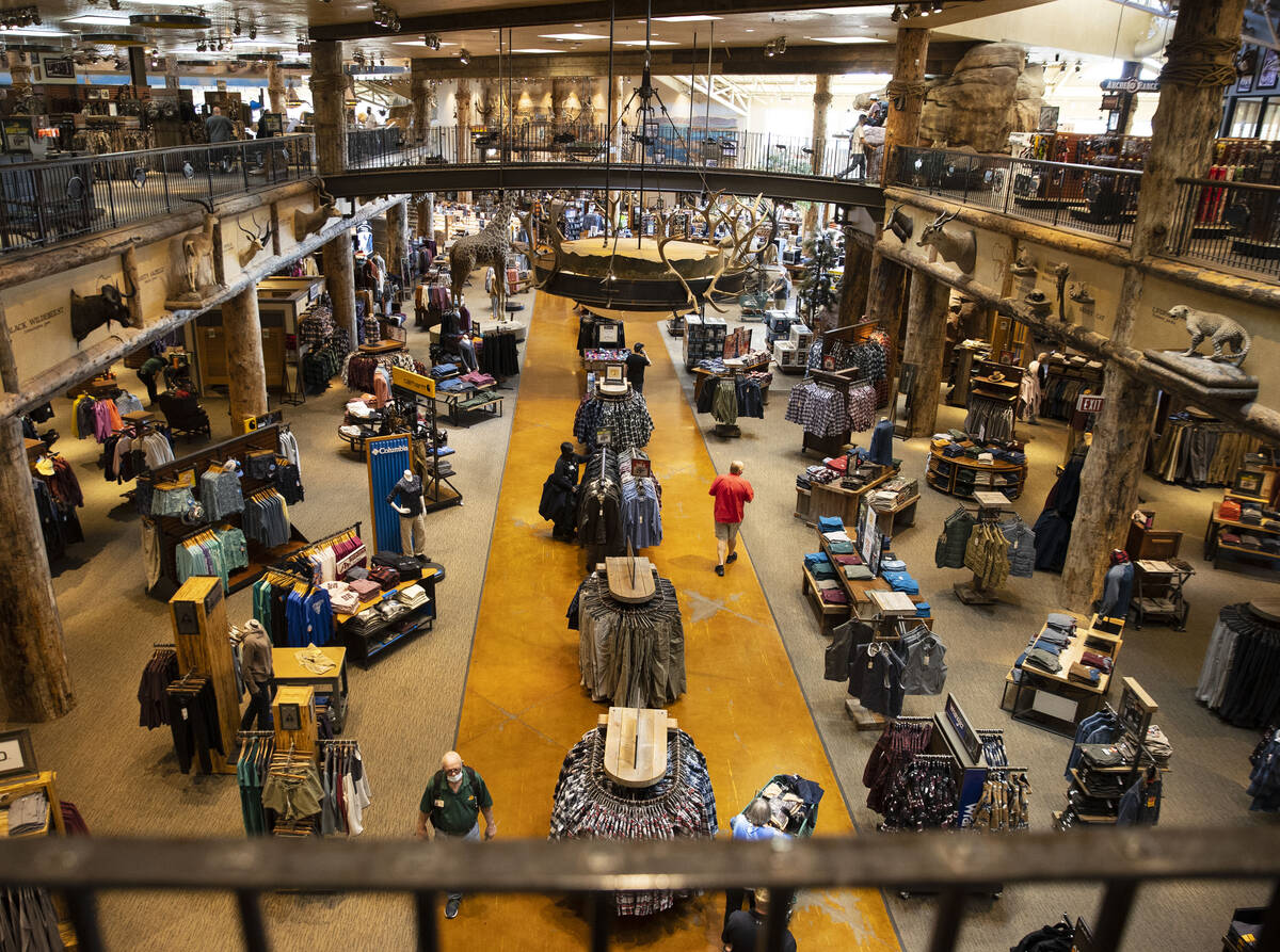 Customers shop at Bass Pro Shop, on Thursday, Oct. 14, 2021, in Las Vegas. The store is hoping ...