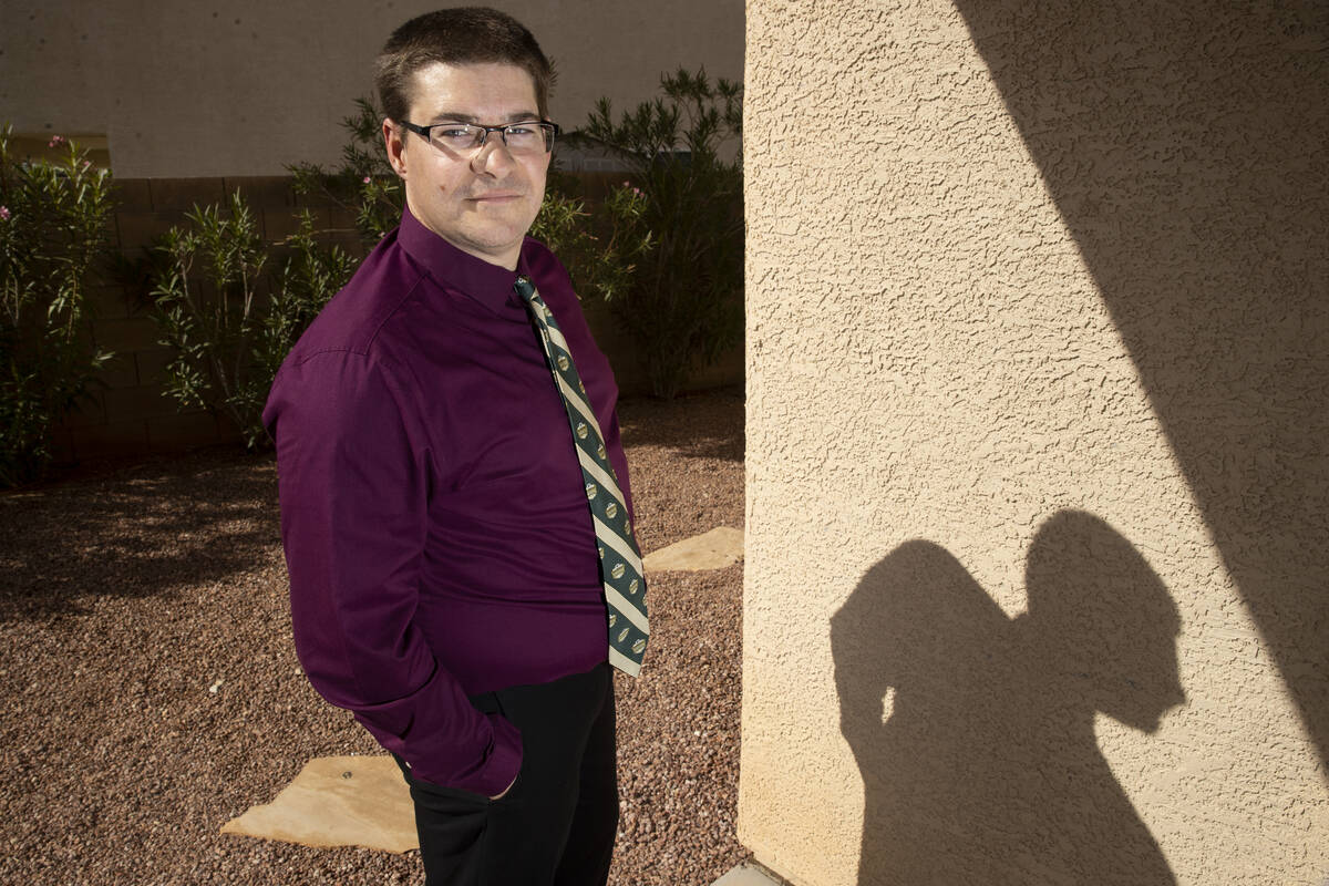 Chris Astrella, who applied for jobs in Las Vegas for ten months, poses for a portrait at his h ...