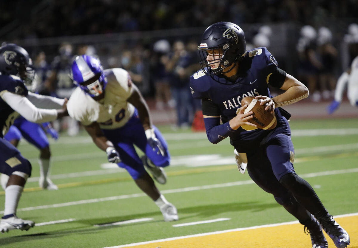 Foothill High School's quarterback Jack Thow looks to throw the ball during the first half of ...