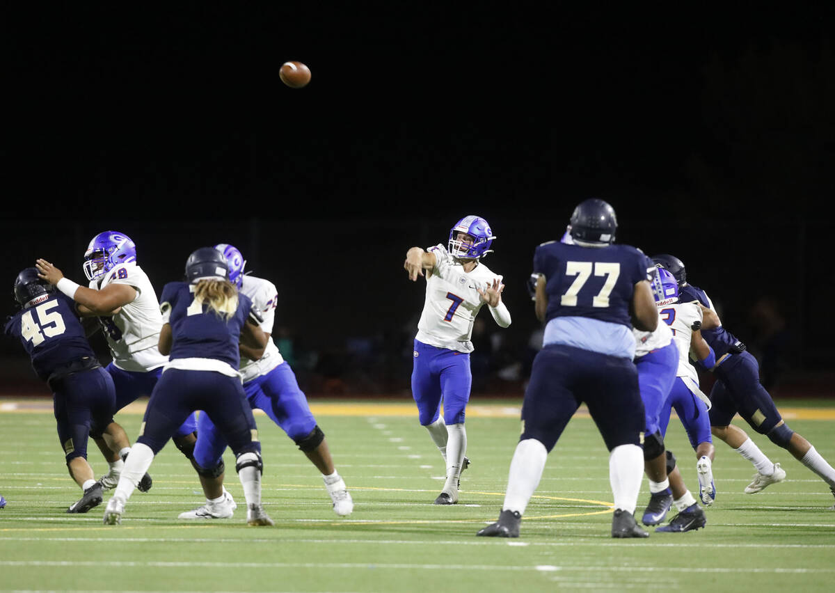 Bishop Gorman High School's quarterback Bishop Gorman High School's Styles Stockham (7) throws ...