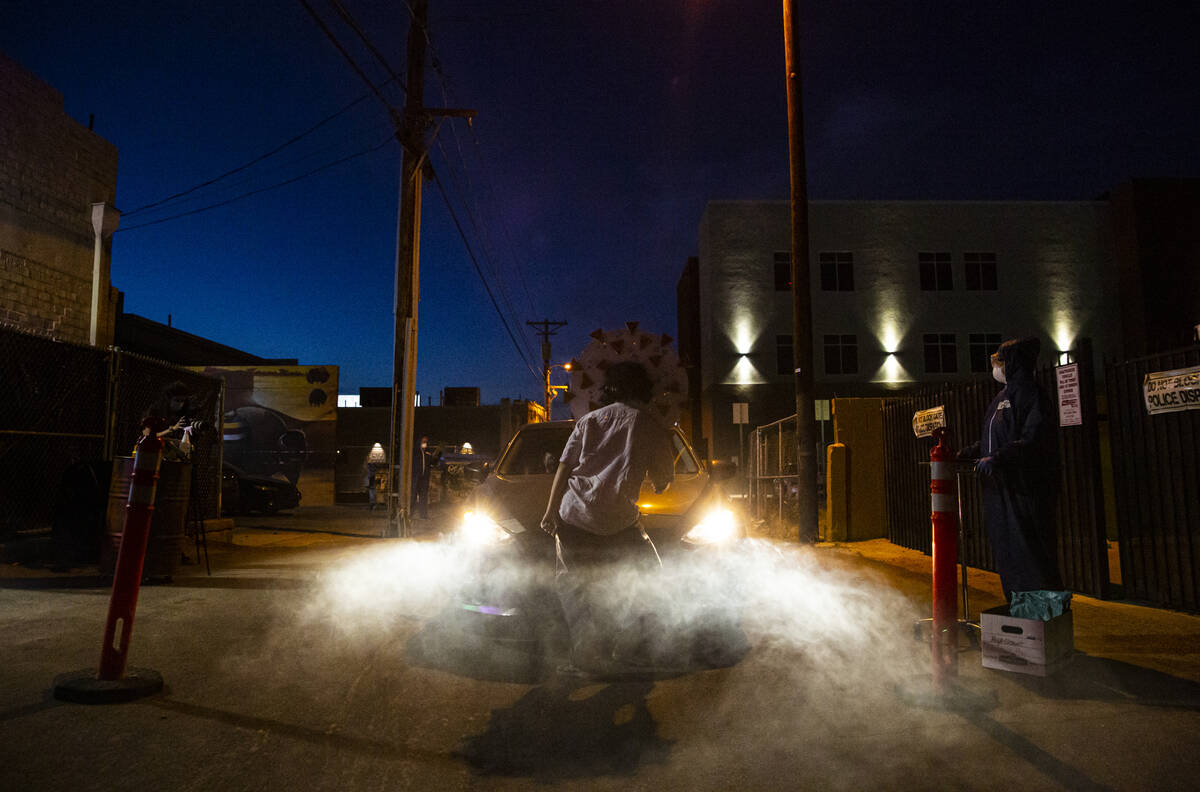 Adriana Chavez performs as part of the Majestic Drive-Thru Theatre in downtown Las Vegas on Fri ...