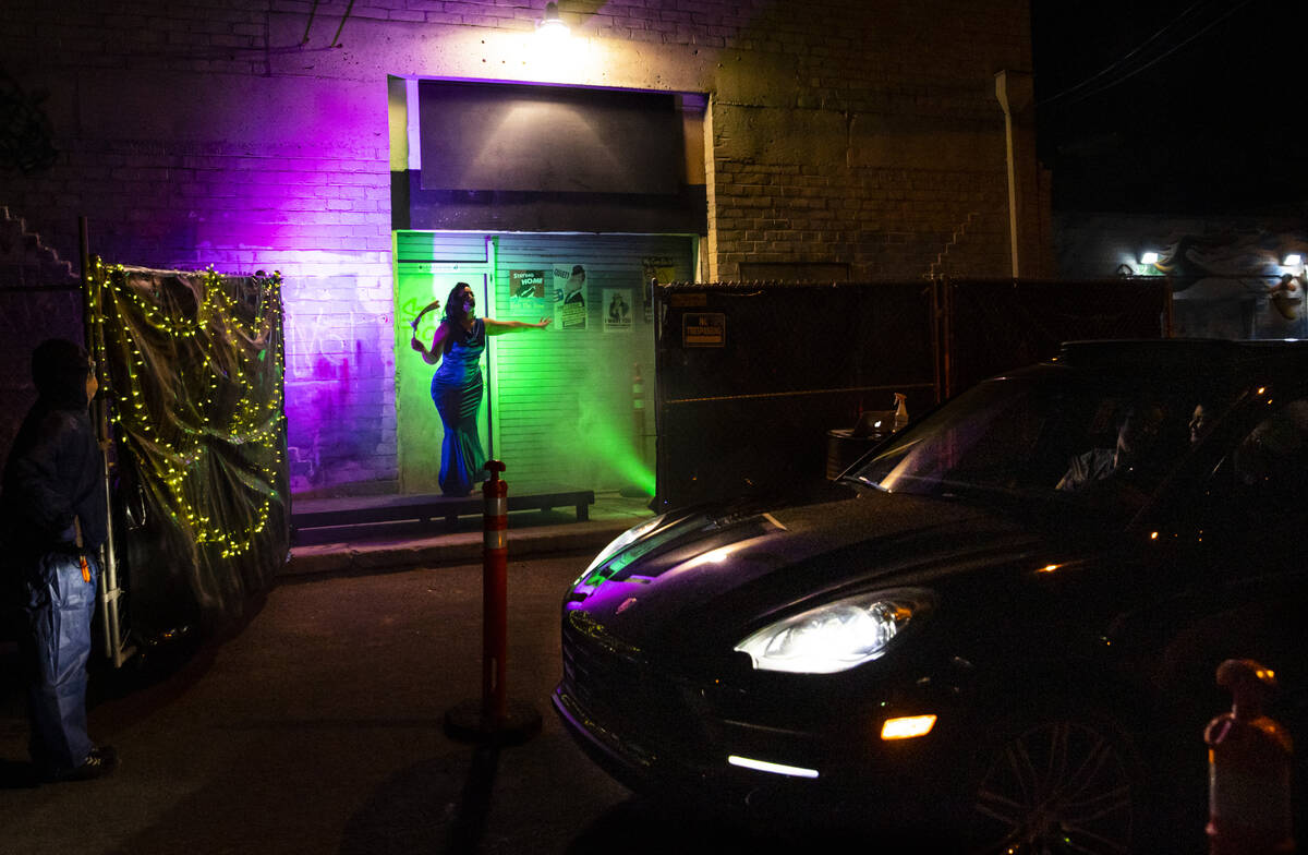 Kim Amblad performs as part of the Majestic Drive-Thru Theatre in downtown Las Vegas on Friday, ...