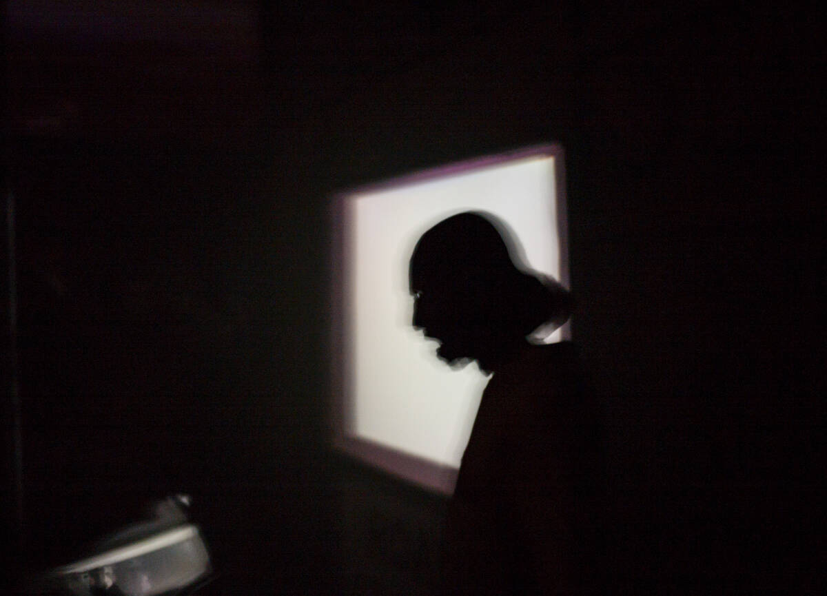 A silhouetted performer is seen during the Horrorwood Video drive-in at the Majestic Repertory ...