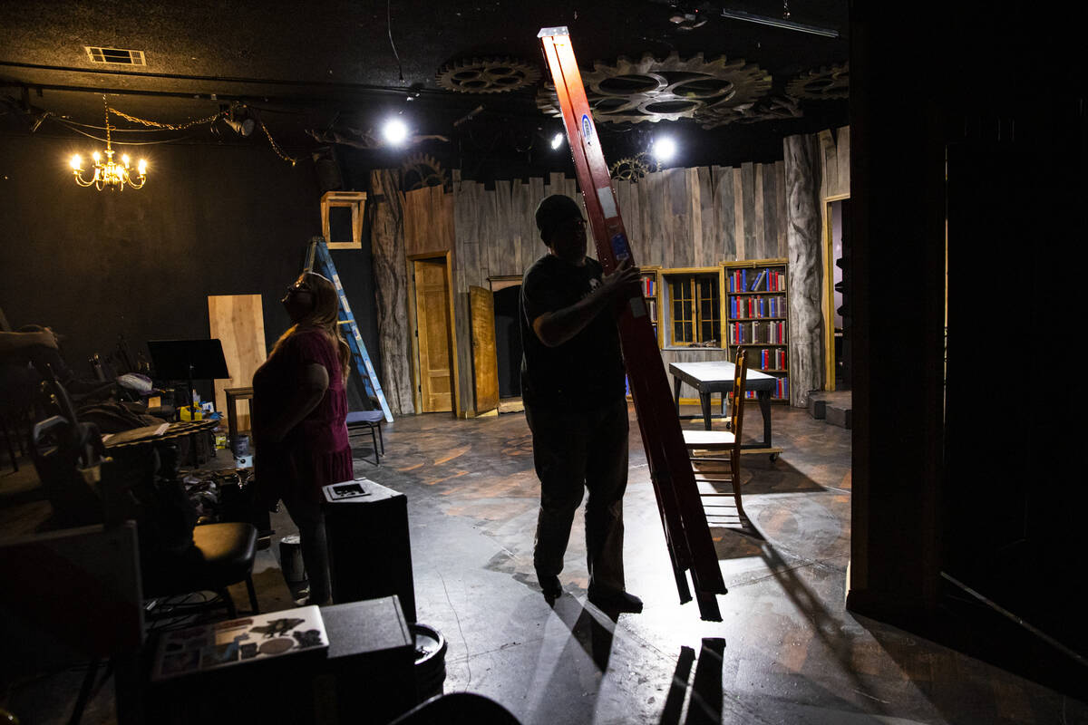 Director Troy Heard moves a ladder during a technical rehearsal for Ҕhe SandmanӠat ...
