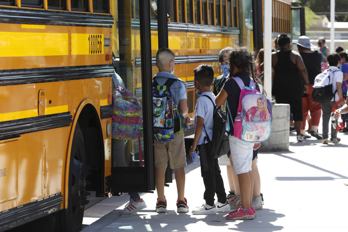 John S. Park Elementary School students leave the school after their class in Las Vegas, Wednes ...