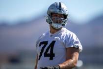 Raiders offensive tackle Kolton Miller (74) walks the field during a practice session at the Ra ...