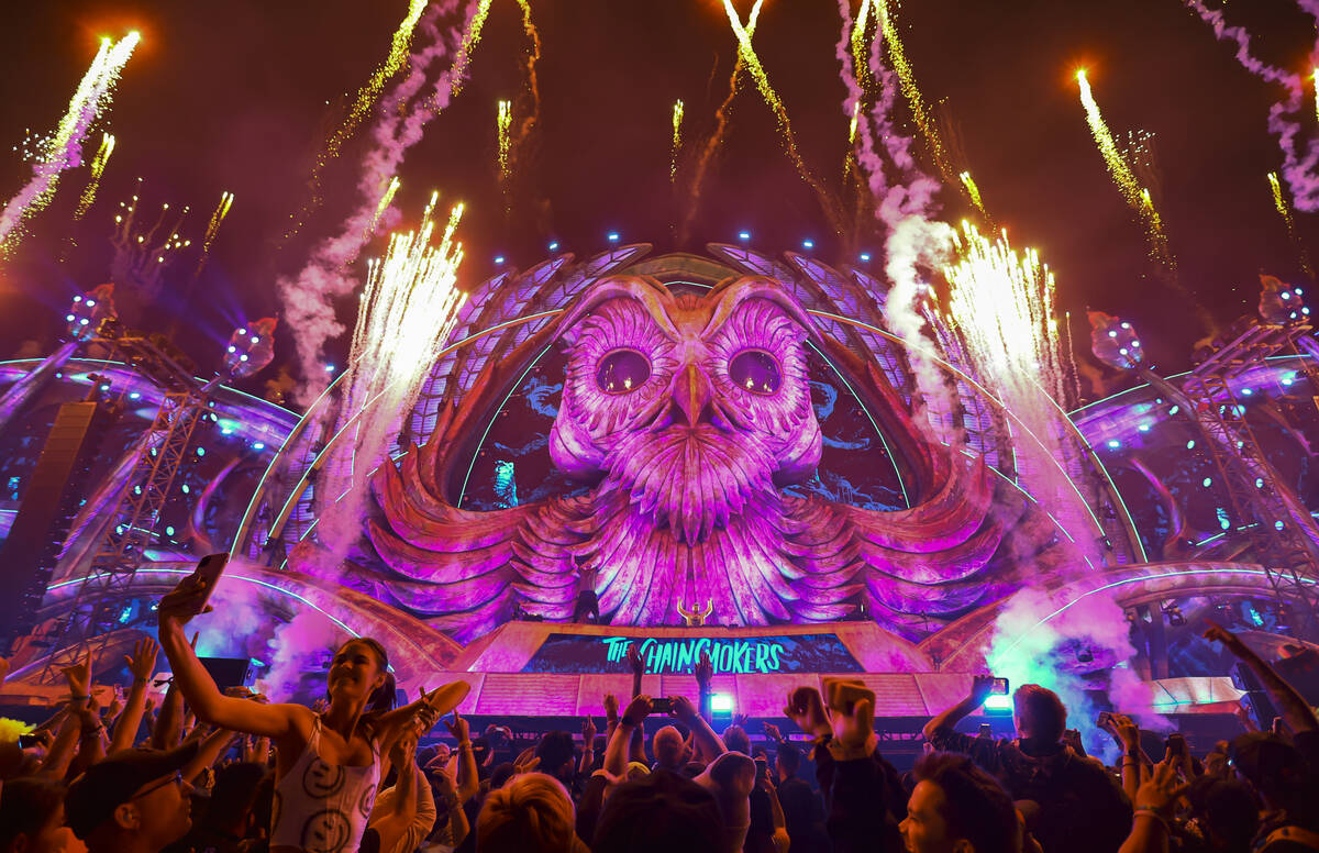 Fireworks go off as The Chainsmokers perform at the Kinetic Field stage during the first day of ...