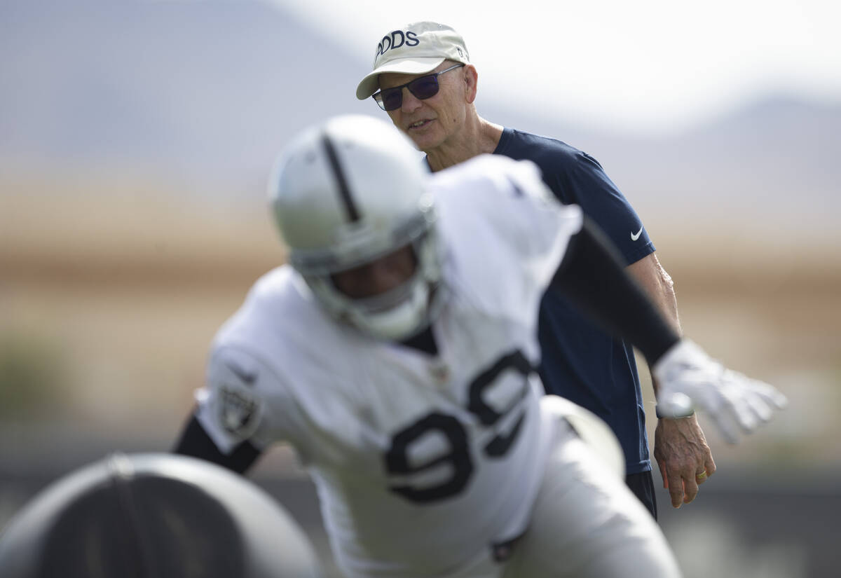 Raiders defensive line coach Rod Marinelli looks on as Raiders defensive end Clelin Ferrell (99 ...