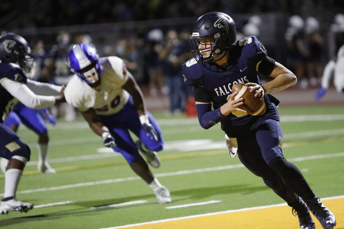 Foothill High School's quarterback Jack Thow looks to throw the ball during the first half of ...