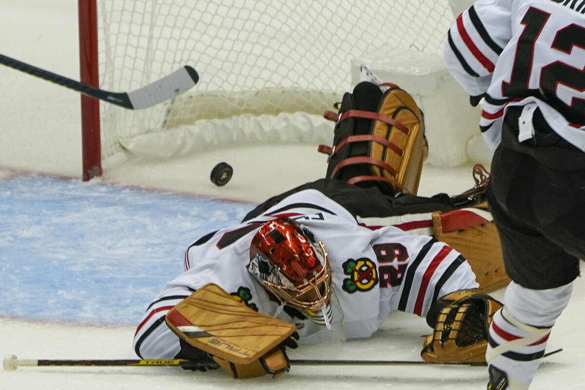 Chicago Blackhawks goaltender Marc-Andre Fleury (29) plays in an NHL hockey game against the Pi ...