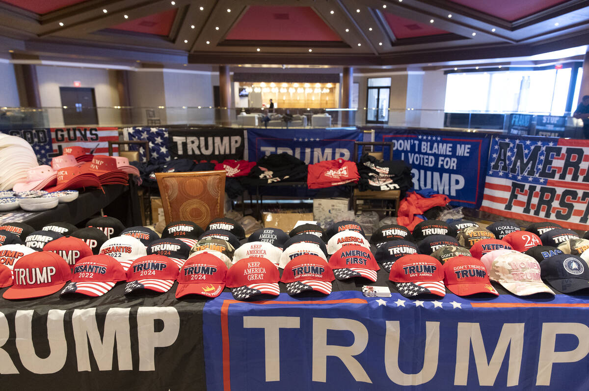 Trump-themed merchandise is for sale during the Qanon-linked Patriot Voice convention at Ahern ...