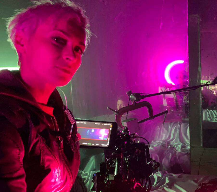 This photo provided by Adam Egypt Mortimer shows cinematographer Halyna Hutchins on the set of ...