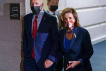 In this Oct. 1, 2021 photo, President Joe Biden and Speaker of the House Nancy Pelosi, D-Calif. ...