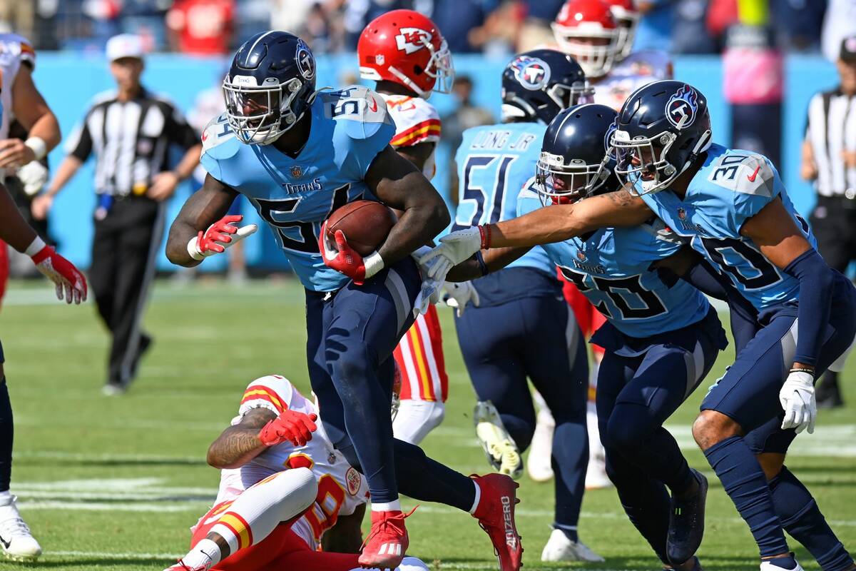 Tennessee Titans linebacker Rashaan Evans (54) celebrates after intercepting a pass against the ...