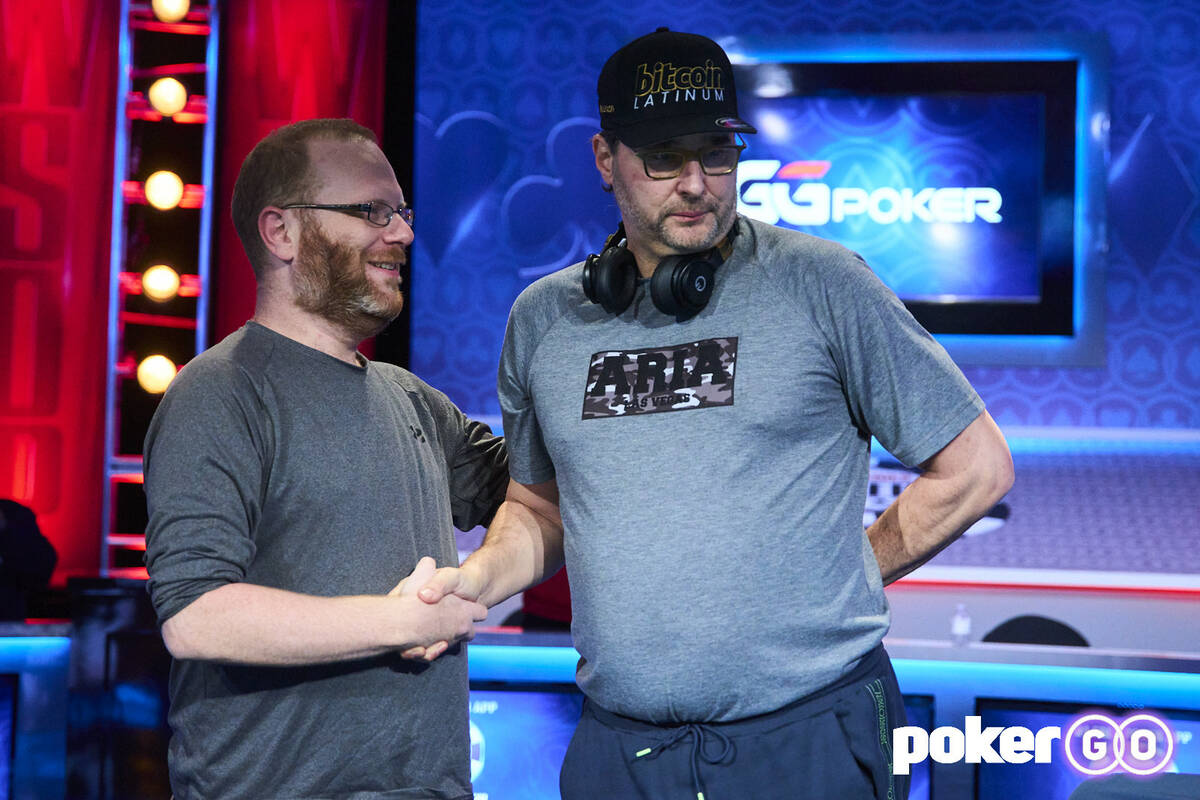 Phil Hellmuth, right, shakes Adam Friedman's hand after the $10,000 buy-in Dealer's Choice even ...