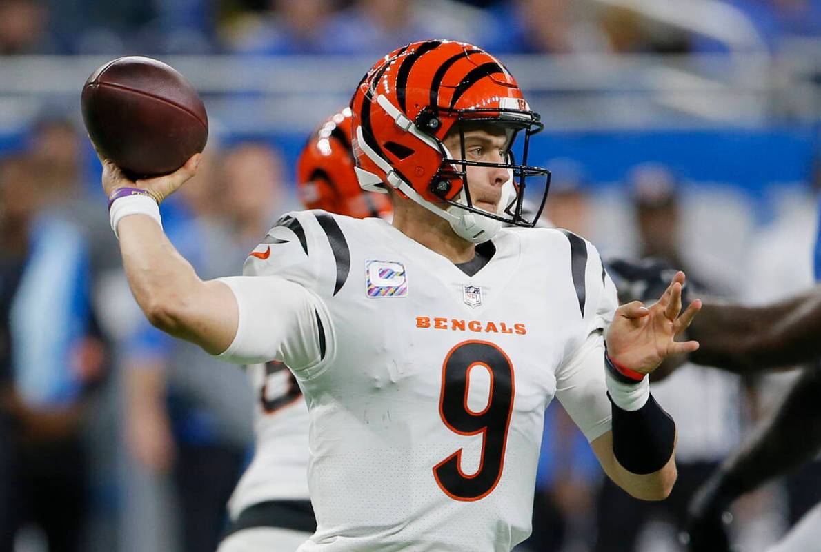 Cincinnati Bengals quarterback Joe Burrow (9) passes the ball during the first half of an NFL f ...