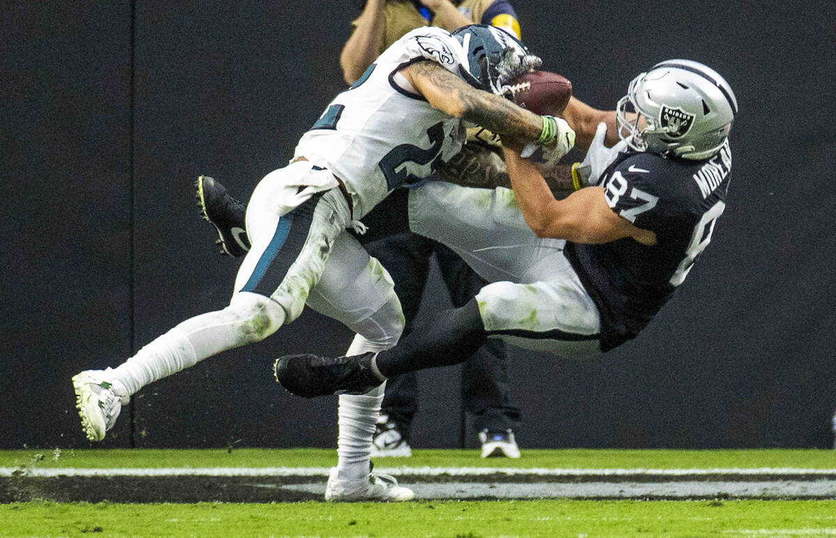 Raiders tight end Foster Moreau (87) battles for a pass in the end zone with Philadelphia Eagle ...