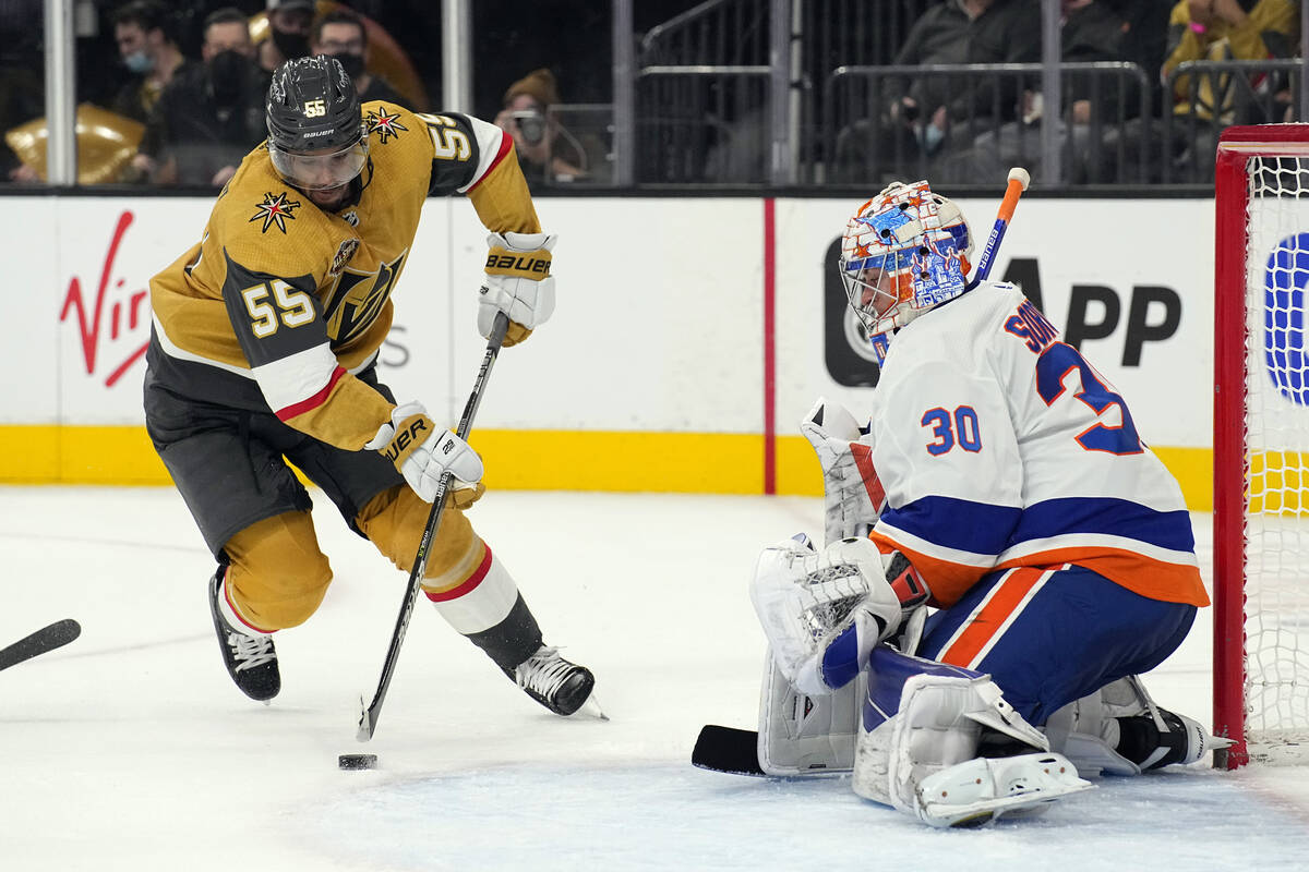 Vegas Golden Knights Keegan Kolesar tries to score on New York Islanders goaltender Ilya Soroki ...