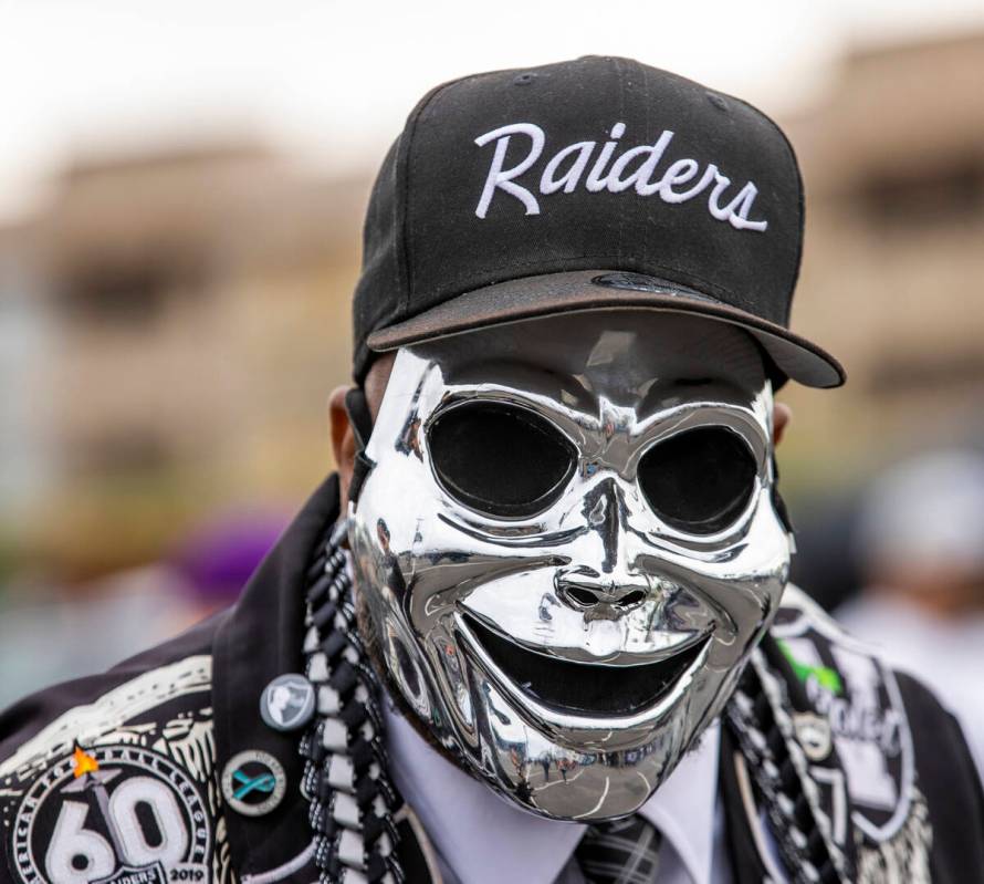 The Mob Boss wanders through tailgating before the first half of an NFL game at Allegiant Stadi ...