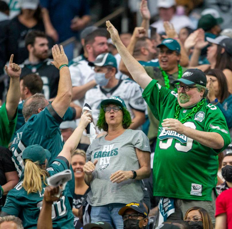 Philadelphia Eagles fans cheer after a touchdown is scored during the first quarter of an NFL f ...