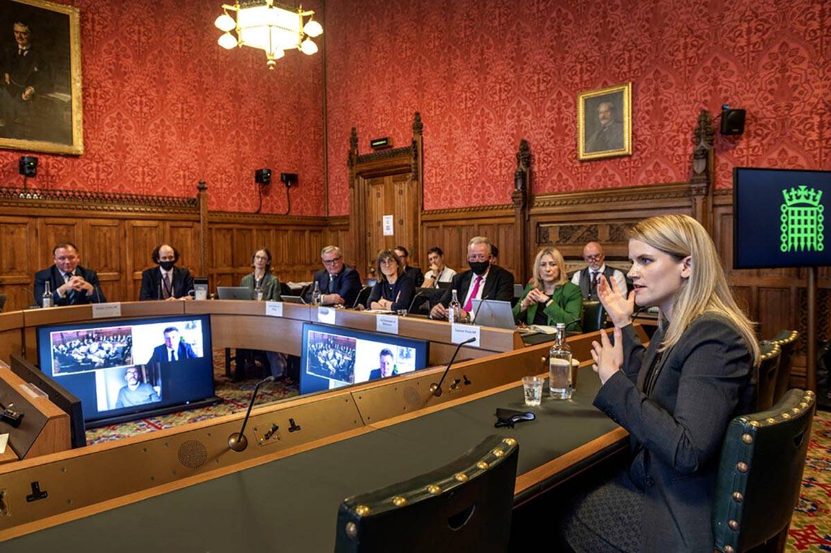 In this handout photo provided by UK Parliament, Facebook whistleblower Frances Haugen, right, ...