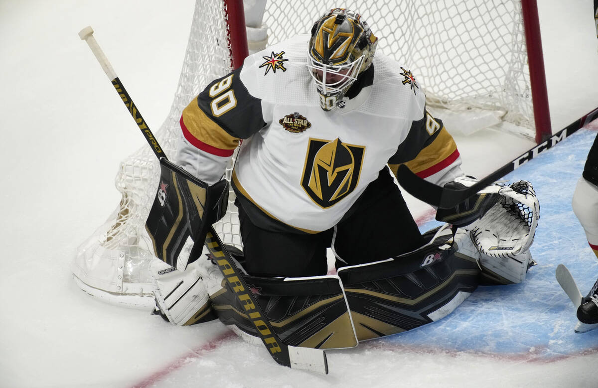 Vegas Golden Knights goalie Robin Lehner blocks a shot while facing the Colorado Avalanche in t ...