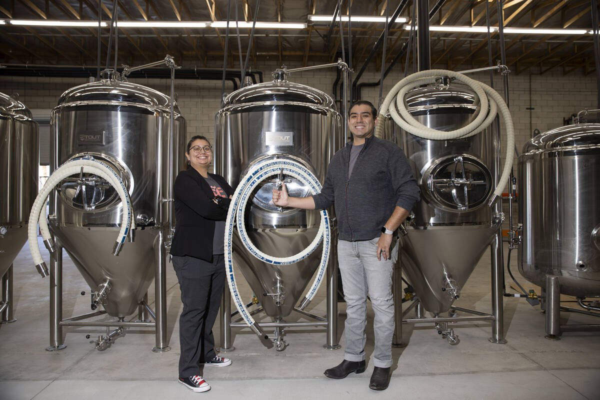 Amanda Payan, left, and her brother, Matt, co-owners of North 5th Brewing Co., pose for a portr ...