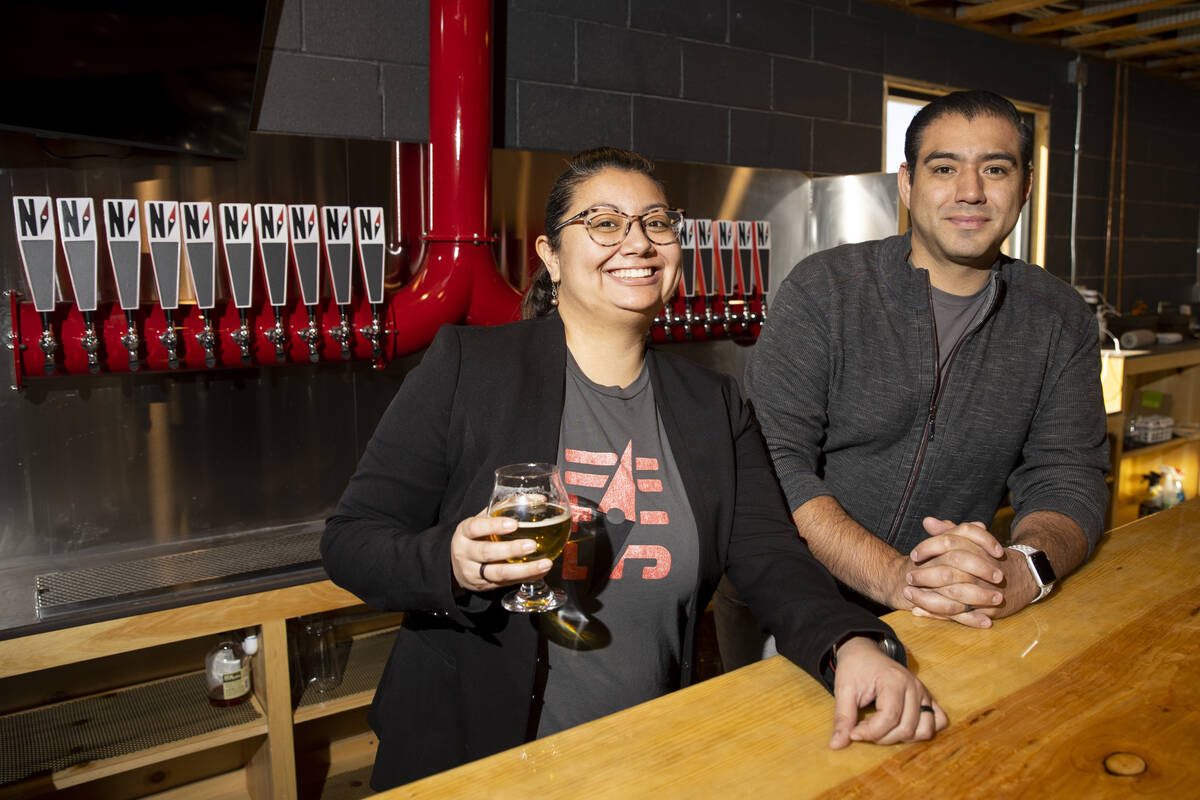 Amanda Payan, left, and her brother, Matt, co-owners of North 5th Brewing Co., pose for a portr ...