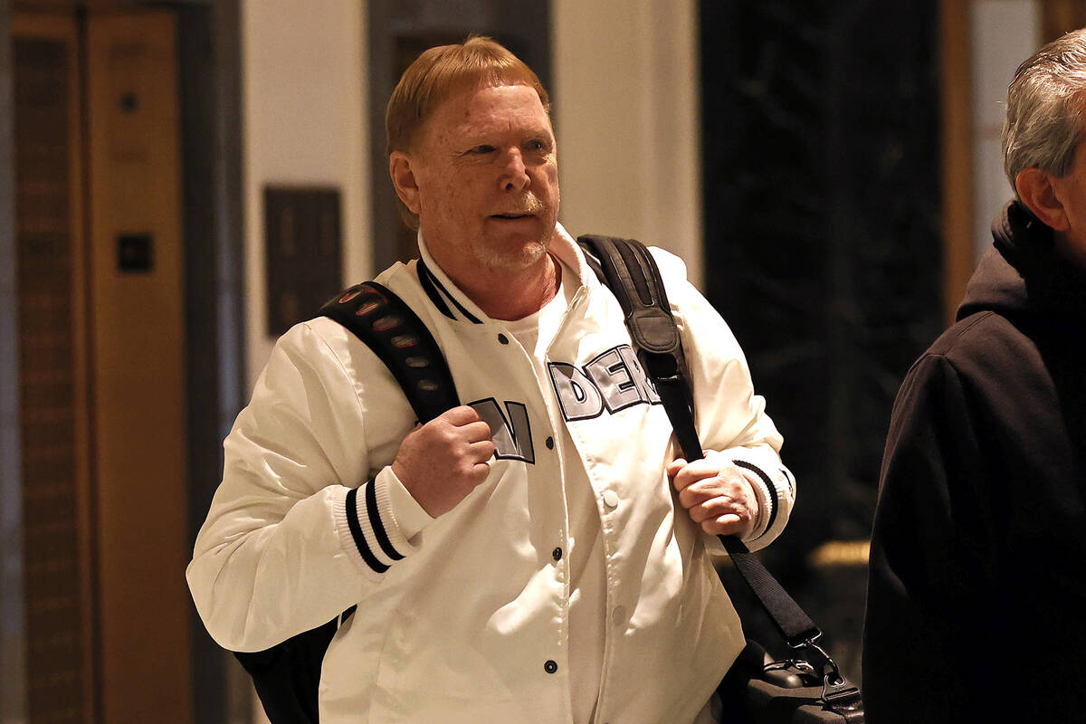 Mark Davis, owner of the Las Vegas Raiders, leaves the NFL owners meeting in New York, Wednesda ...