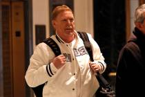 Mark Davis, owner of the Las Vegas Raiders, leaves the NFL owners meeting in New York, Wednesda ...