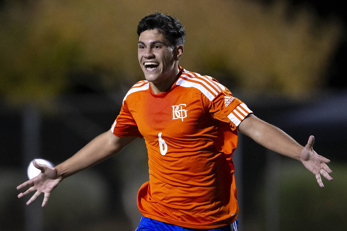 Bishop Gorman's Joseph Chami (6) runs to celebrate with his team after scoring a goal against L ...