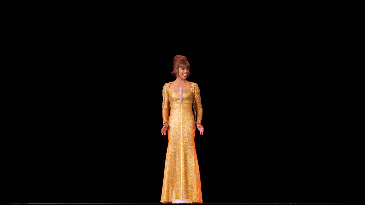 A scene from "An Evening With Whitney: The Whitney Houston Hologram Concert" is shown in this u ...