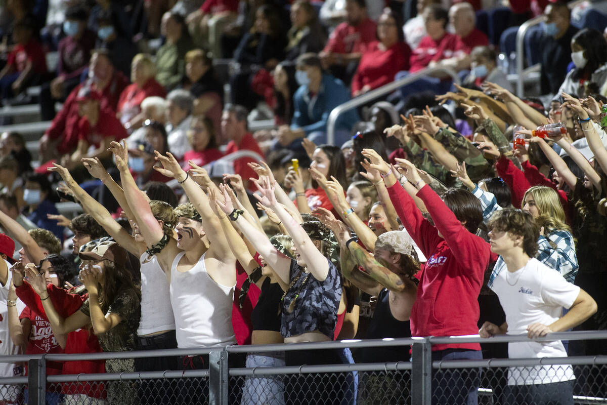 Arbor View fans cheer for their team during a high school football game against Desert Pines at ...