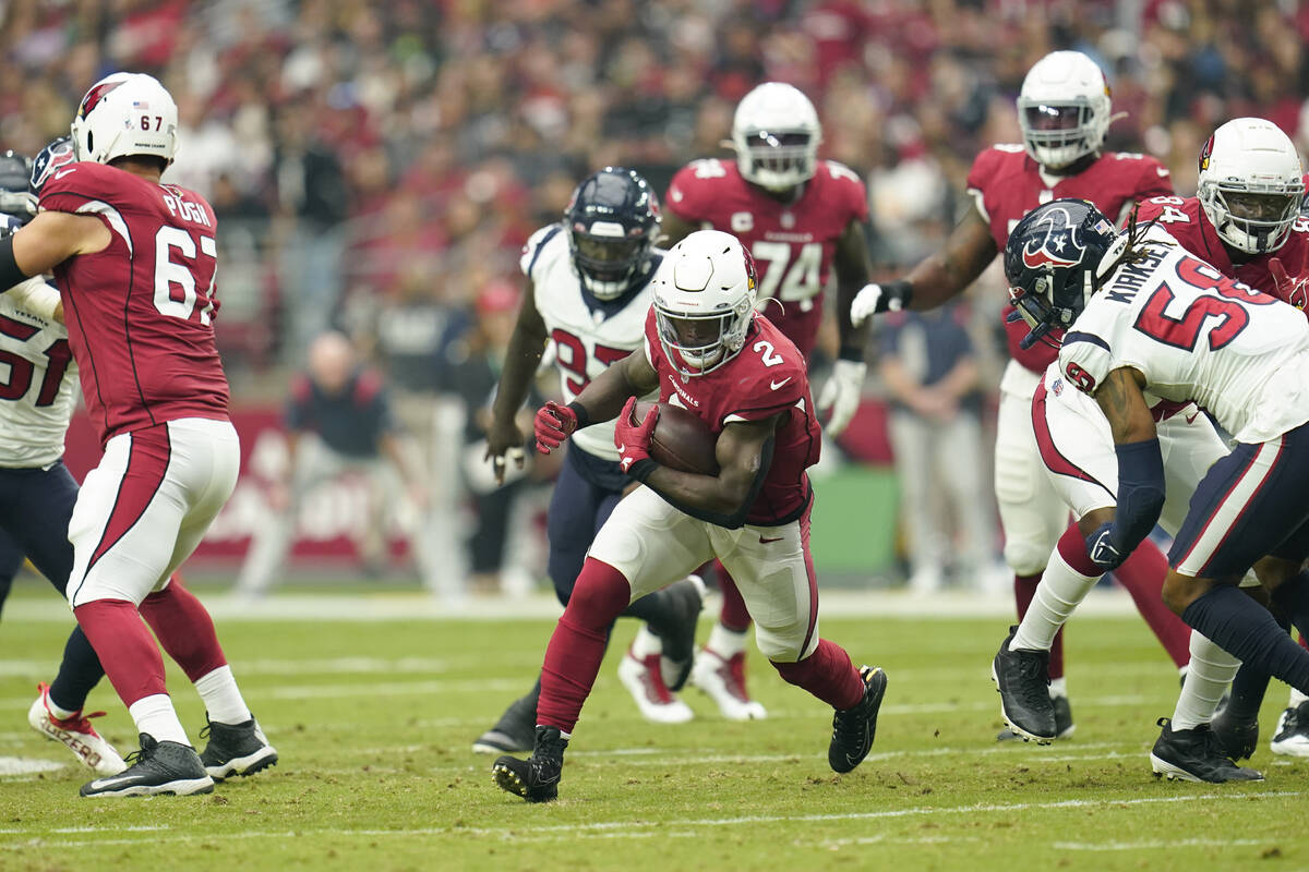 Arizona Cardinals running back Chase Edmonds (2) carries the ball during a NFL football game ag ...