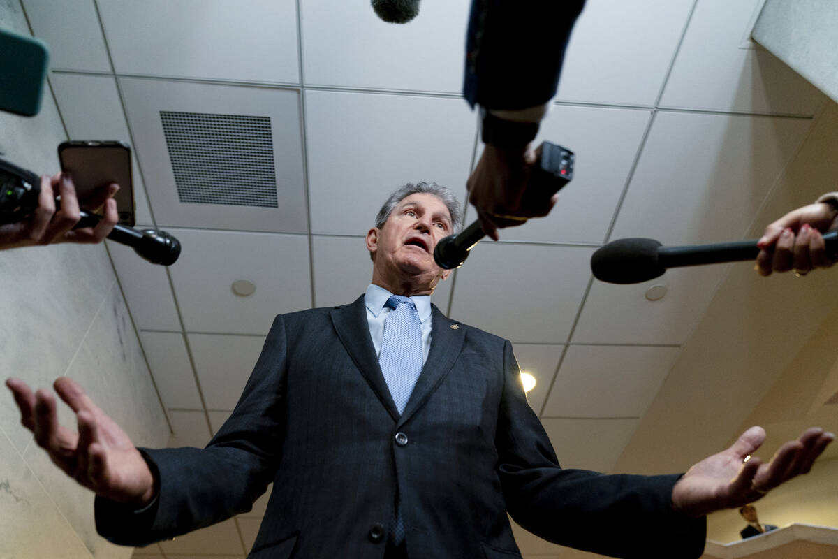 Sen. Joe Manchin, D-W.Va., a key holdout vote on President Joe Biden's domestic agenda, speaks ...