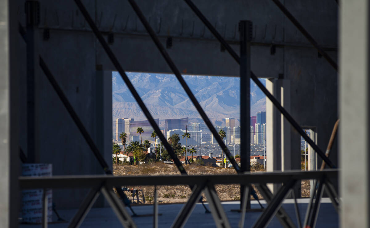 A partial view of the Las Vegas Strip is seen as construction continues on the second building ...