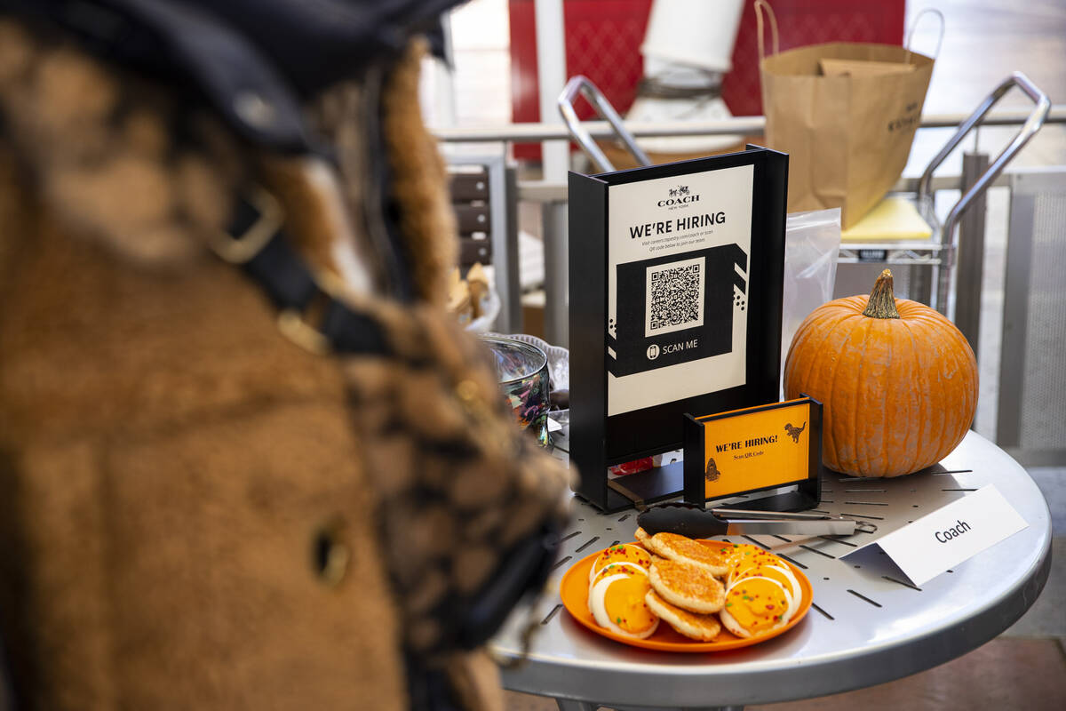 A hiring displey by Coach is seen during a hiring fair at the Las Vegas North Premium Outlets o ...