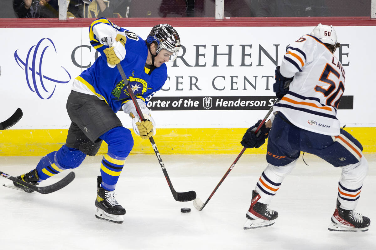 Henderson Silver Knights Ben Thomson (86) competes for the puck with Bakersfield Condors Raphae ...