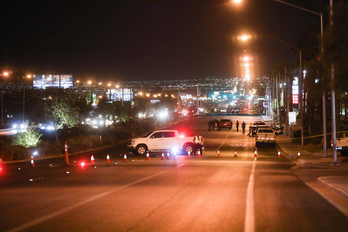 Police at the scene where a pedestrian died after being struck by a vehicle near East Tropicana ...