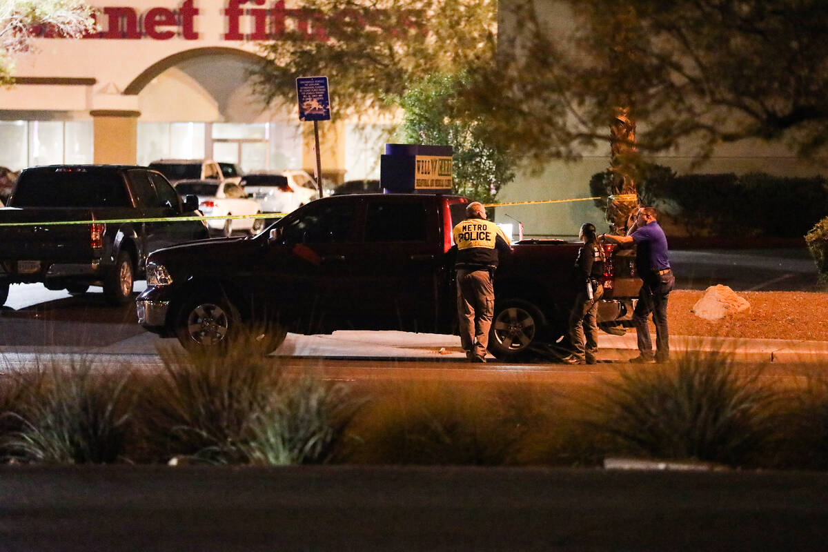 Police at the scene where a pedestrian died after being struck by a vehicle near East Tropicana ...