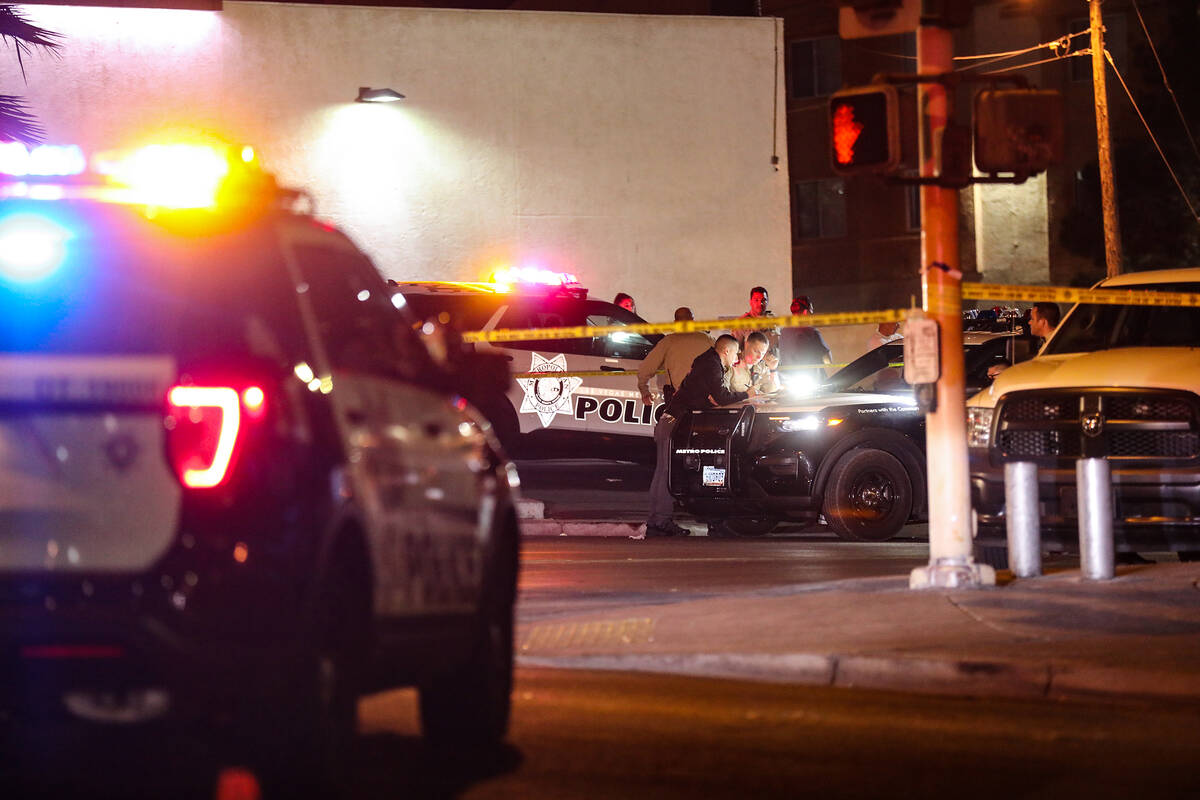 Police at the scene of a homicide investigation on 15th Street and Fremont Street in Downtown L ...