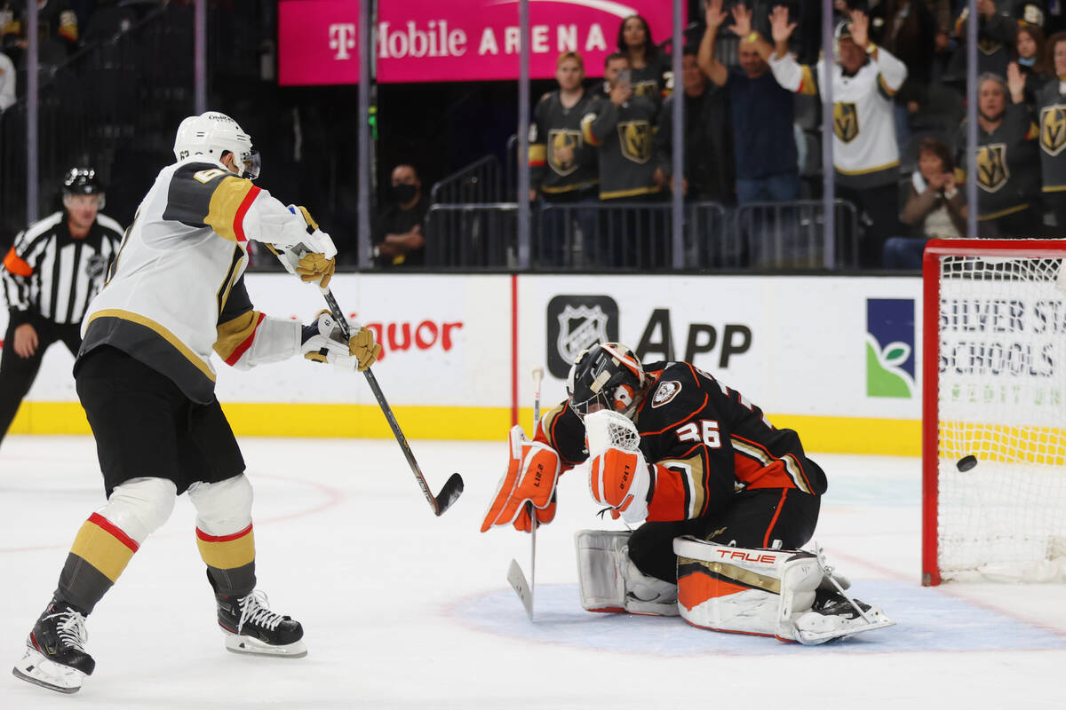 Vegas Golden Knights right wing Evgenii Dadonov (63) shoots the game winning shootout goal agai ...