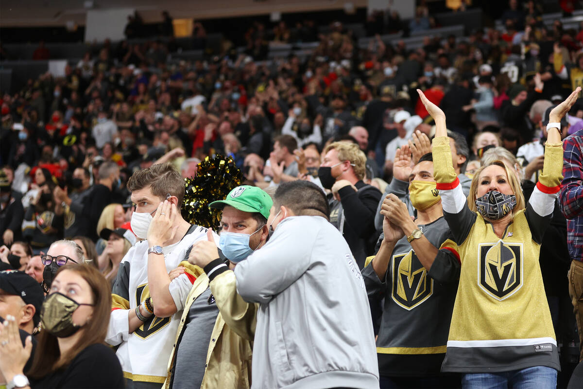 Fans celebrate the Vegas Golden Knights shootout win against the Anaheim Ducks during an NHL ho ...