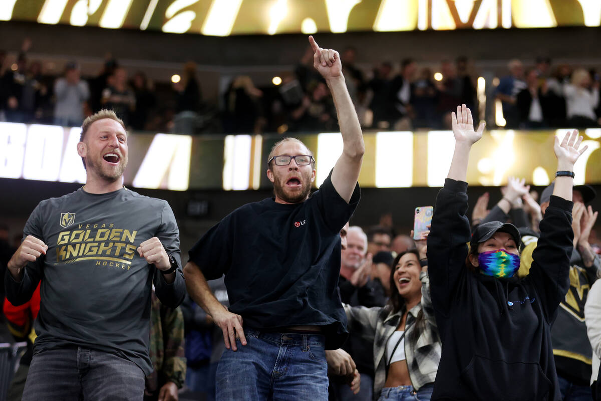 Fans celebrate the Vegas Golden Knights shootout win against the Anaheim Ducks during an NHL ho ...