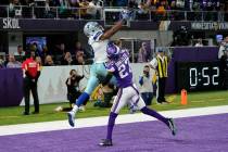 Dallas Cowboys wide receiver Amari Cooper (19) catches a 5-yard touchdown pass over Minnesota V ...