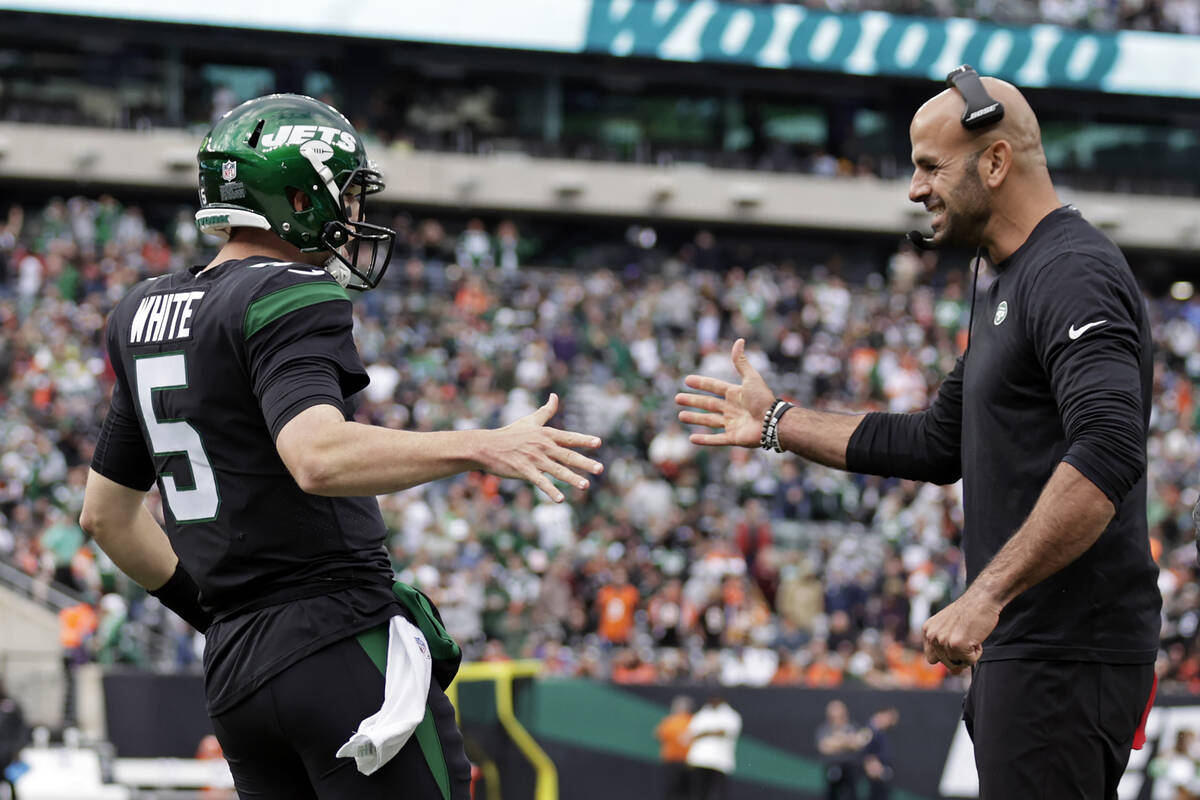 New York Jets quarterback Mike White (5) reacts with head coach Robert Saleh against the Cincin ...